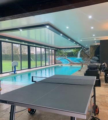 Chalet charmant à Clermont-Créans avec piscine partagée