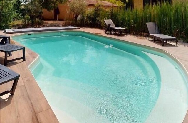 Charming house with wooded grounds & saltwater pool.