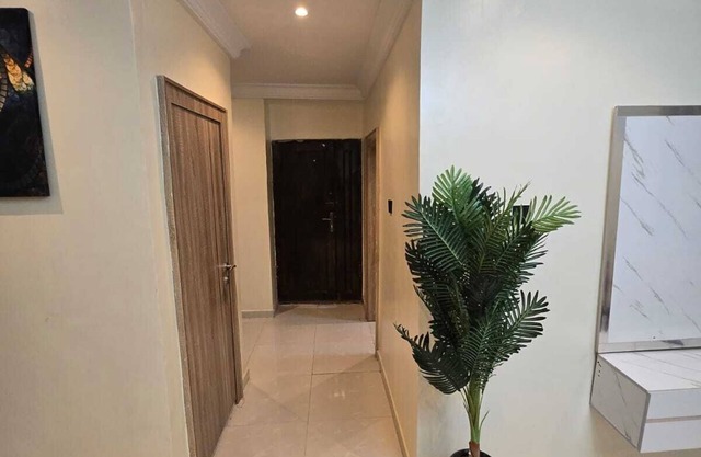 Charming 2-bedroom apartment in welcoming Ogba Area of Ikeja, with AC, WiFi, PS5