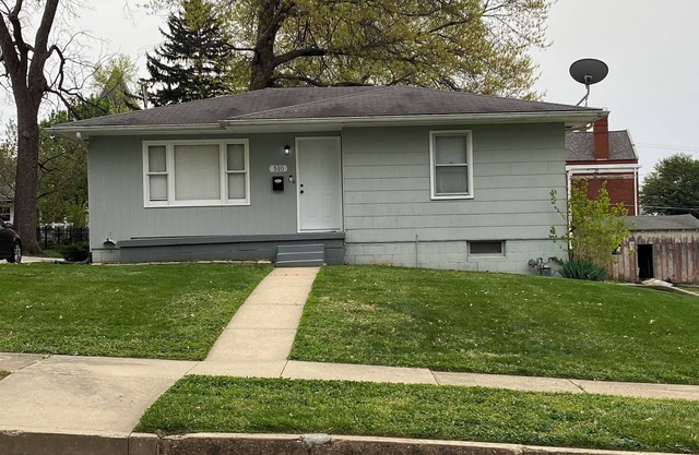 Charming 2-bedroom house in Atchison on quiet brick and tree lined street.
