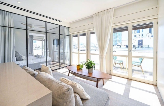 Charming 2BR with Balcony w/Mamad near Hilton Beach by HolyGuest