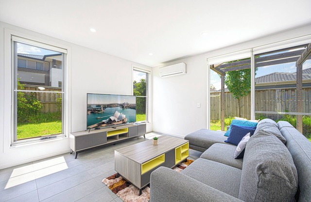 Charming 4-bedroom house in delightful Denham Court with AC, WiFi