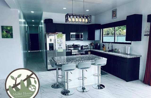 Charming 4-bedroom house with AC and WiFi in marvelous La Fortuna