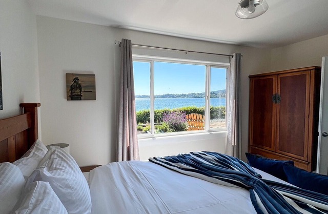 Charming Beachfront Cottage with Private Deck and Hot Tub-family/pet-friendly!