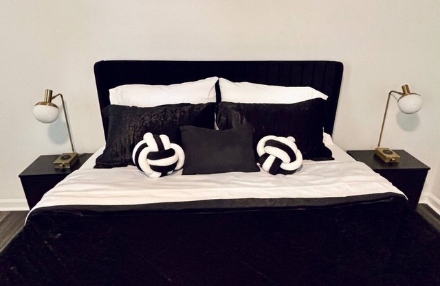 Charming black white & gold bedroom ensuite at The Retreat