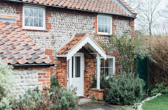 Charming detached flint cottage on village green, 5 minute stroll to beach