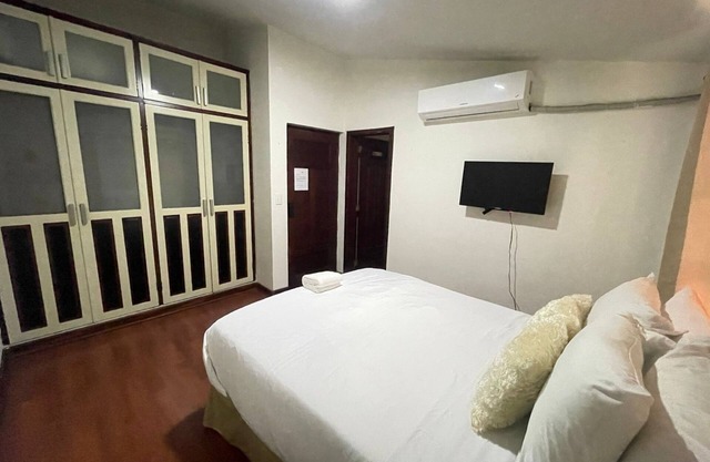 Charming hotel room near City Mall with Pool, grill, and kitchen