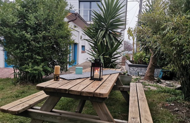 Charming house with white mill.