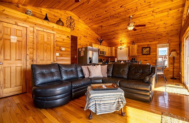 Charming riverside with stunning views, cozy interiors, full amenities, and spacious decks.