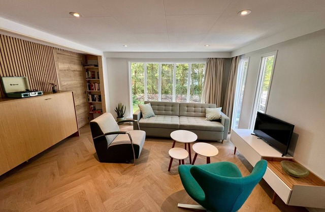 Child-friendly holiday home near a pool and playground in the forests of Veluwe