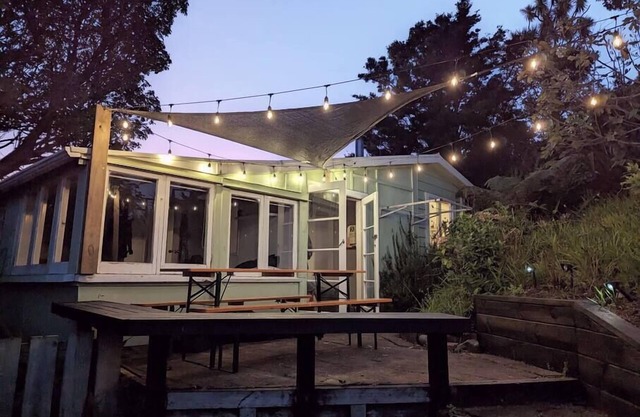 Classic Kiwi bach & sleep-out with a stunning view