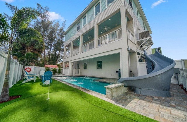 Coastal Breeze - 90 seconds from door to sand. Heated pool with slide & spa.