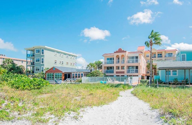 COASTAL RETREAT! Perfect Beach Location! Walk to Restaurants & More!