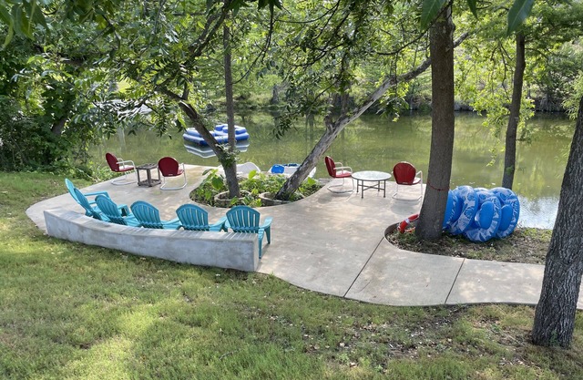 Colorful waterfront retro compound, airstream kitchen, hot tub, media barn!