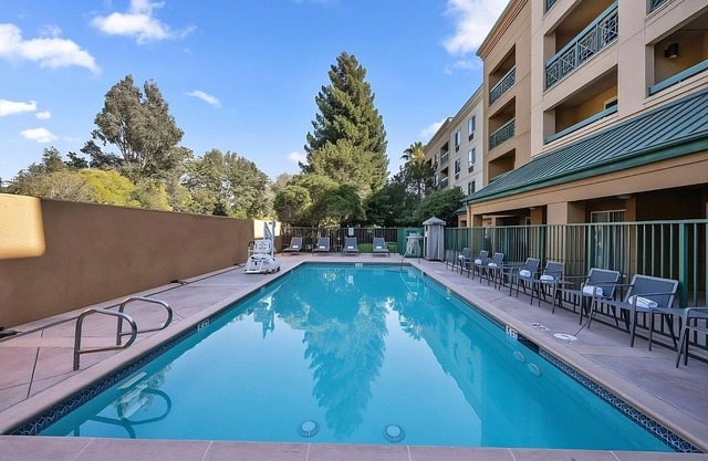 Comfort and Convenience! Outdoor Pool, Free Parking, Close to Windy Hill Park!