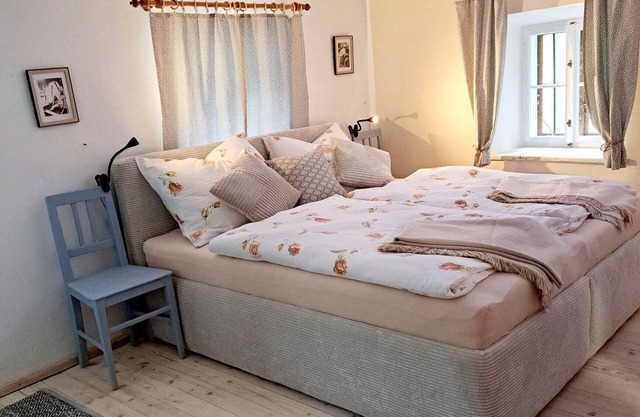 Compact vacation apartment (36 m2) in a secluded location with fireplace, terrace & stream access