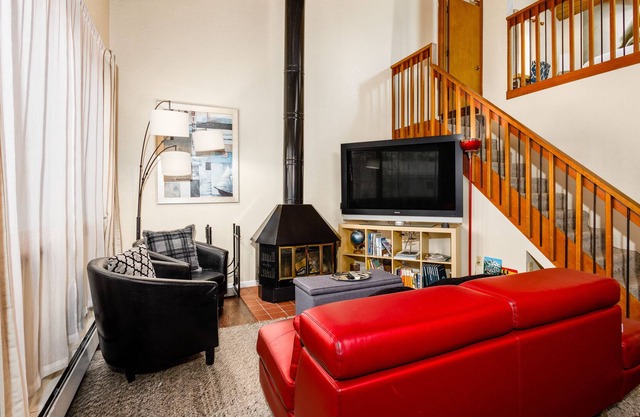 Conveniently located loft apartment with fireplace & private washer/dryer