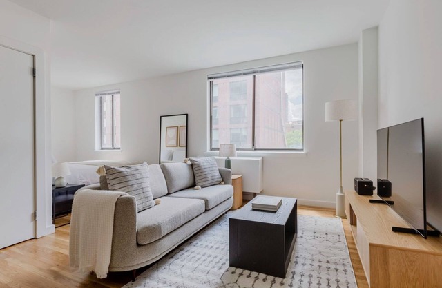 Cool Chelsea Studio w/Elev & Shared W/D, nr Market, by Blueground