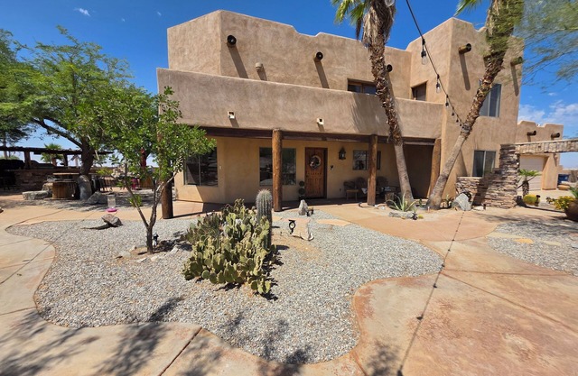 Cool down in this desert oasis Pool home, with mountain views.