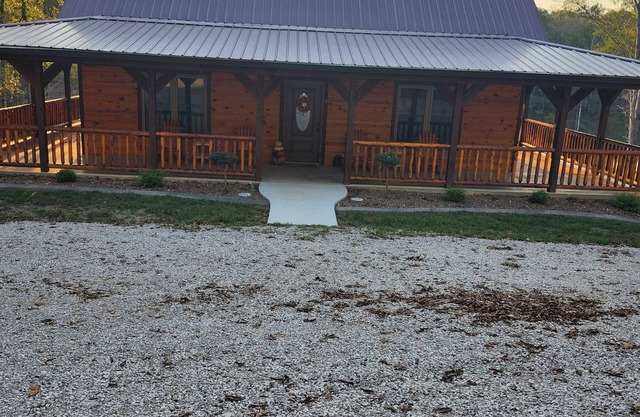 Cozy 4-bedroom cabin with a private lake. Pet Friendly.