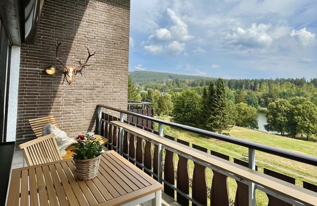 Cozy 5 star apartment with a dream view. Hiking trails and bathing lake nearby.