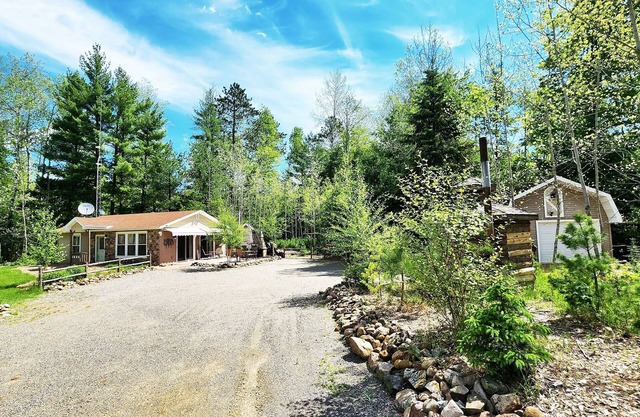 Cozy cabin on 5 acres of wooded land!