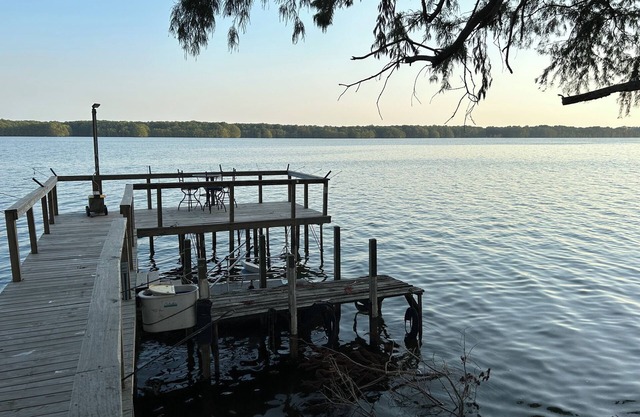 Cozy lake front home on beautiful Lake Washington. Deck, dock and boat slip.