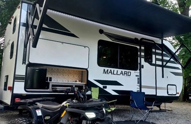 Cozy RV in our land with community private beach, fire pit, bring your boat.