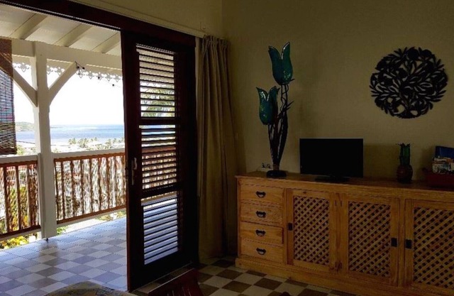 Cozy studio with beautiful terrace overlooking the sea and garden