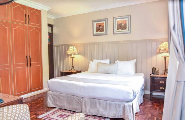 Cozy Superior Room with AC & Fitness Access in Vibrant Nairobi