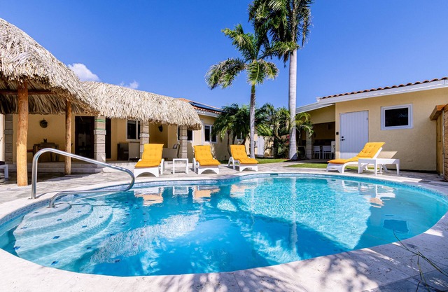 Cozy Tropical Retreat w/Resort-style Pool! *5 min to beaches*