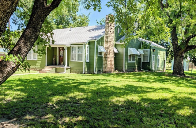 Cozy two-bedroom house with central heat and air. Close to downtown Ark City.