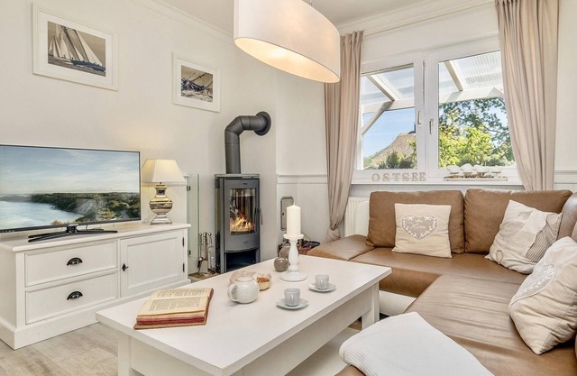 Cozy vacation apartment on the Baltic Sea in the green, with fireplace and sauna.