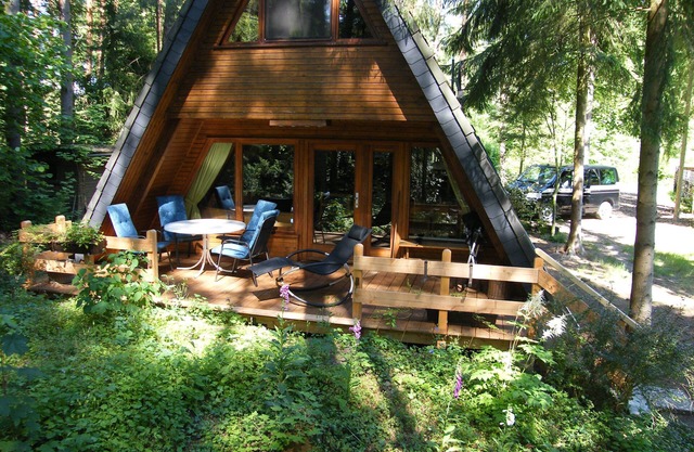 cozy wooden house in an idyllic pine forest settlement with nearby fishing waters!