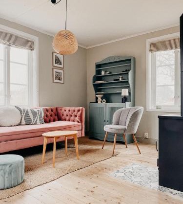 Cozy wooden house with wood stove in Småland