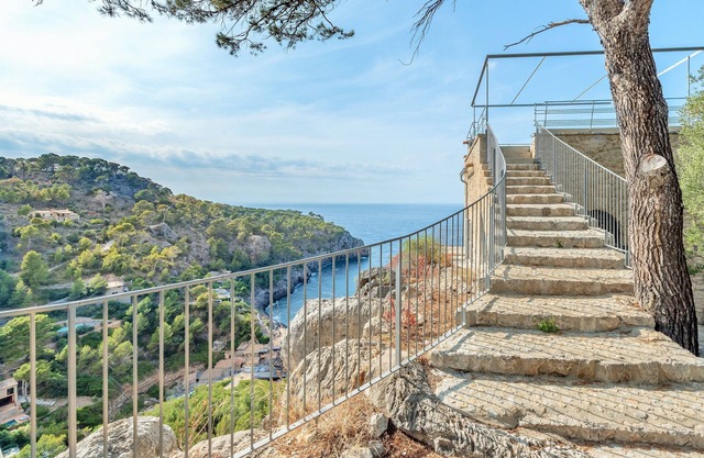Deia tower overlooking the sea and it famous cove.