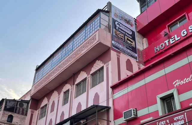 Deluxe Twin Double Bedroom with Private Ganga View Balcony.