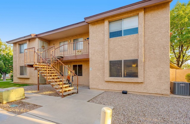 Dog-friendly condo with enclosed patio, pool, hot tub, & W/D - snowbirds OK