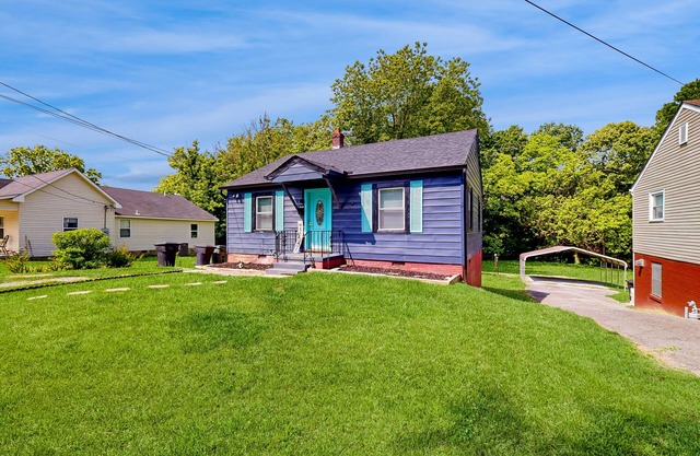 Dog-friendly spacious home near lake & town with fireplace & private backyard