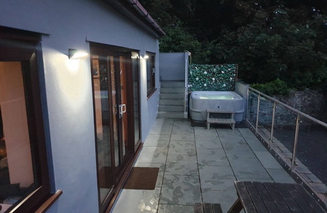 Dog friendly villa with hot tub overlooking the town with sea and mountain views