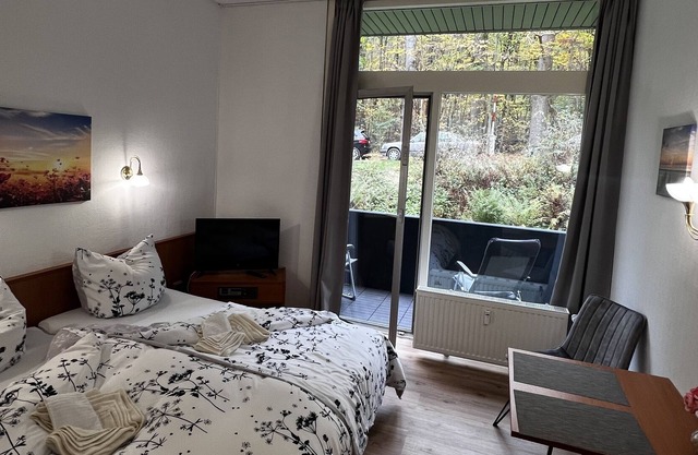 Doppel-/ Zweibettzimmer mit Bergblick 9