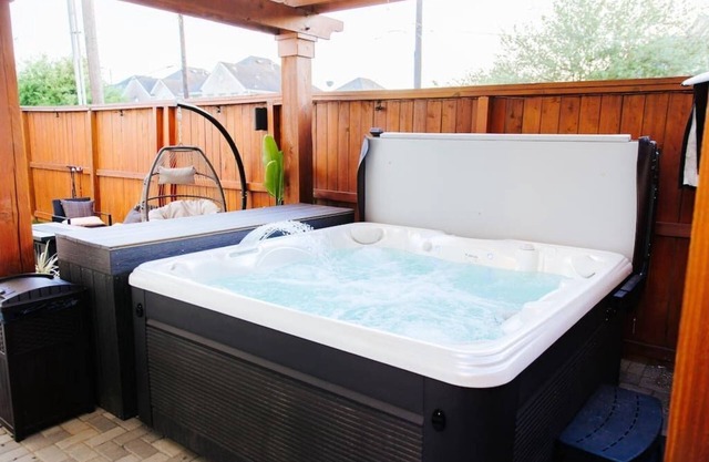 Downtown Escape with Backyard, Gameroom and Hot Tub