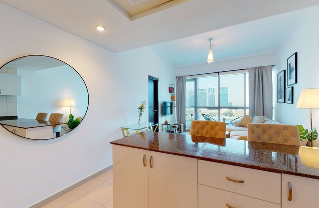 Dubai Holiday Homes | 1 BHK Apartment in Bay Central West Marina