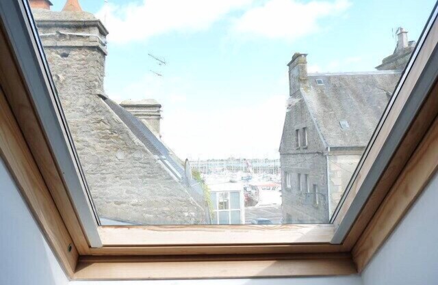Duplex overlooking the port in the heart of the city.
