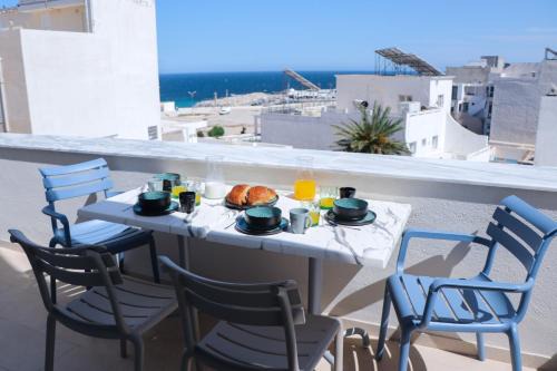 Duplex terrasse vue mer et ville, Pieds dans l'eau