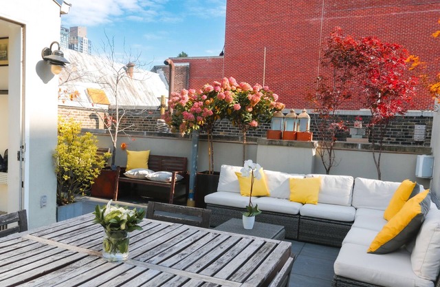 Elegant 2-Bed 2-Bath Triplex With Private Roof Terrace and Empire State Views