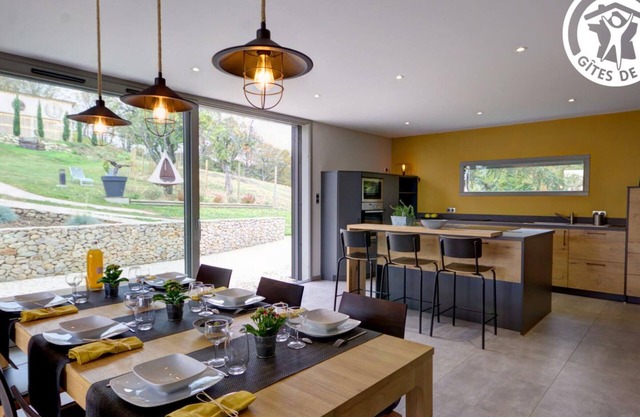 Elegant Modern Cottage with Garden, Terraces, and Pond