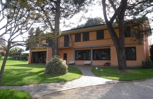Elegant villa surrounded by a large garden available to guests