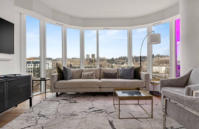 Elite Urban Living: 3BR w/DT Views, AC & Parking
