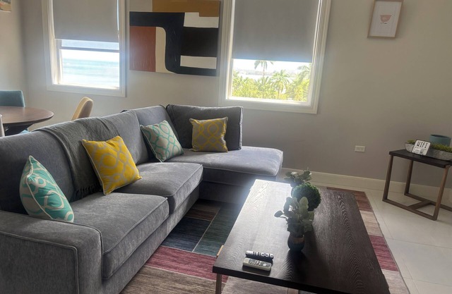 Enjoy and relax! Spacious 2/2, ocean views, gym,& pool, in lovely Montego Bay!